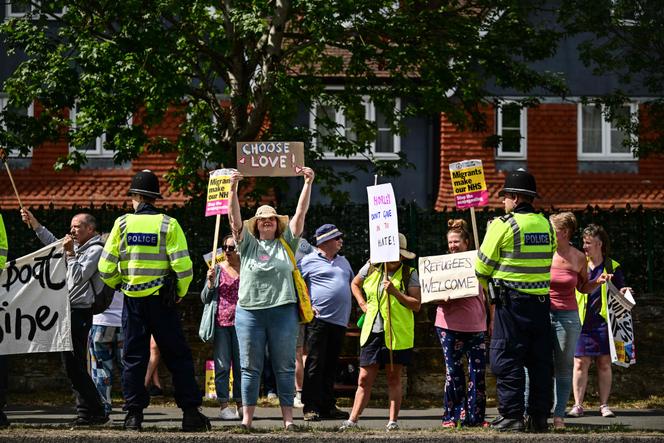 The British government has promised to speed up the processing of asylum applications as protests at hotels mount.